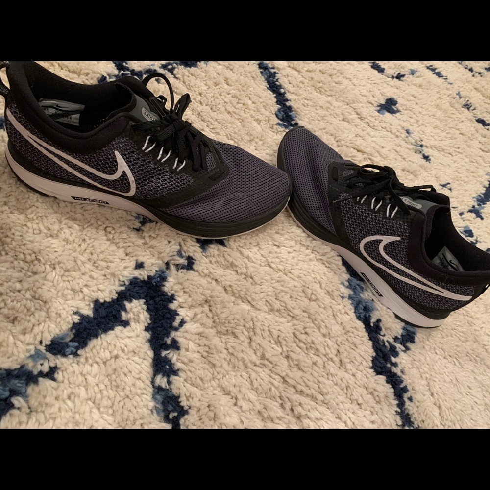 Nike zoom strike running shoes.